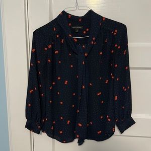 Floral and navy long sleeve blouse with tie neck
